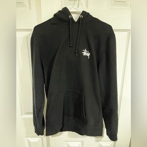 Authentic Stüssy pull-over sweatshirt Size M. black with large back logo. New